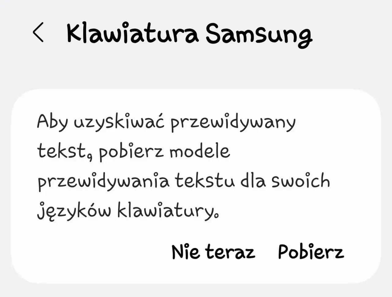 Ekran z tekstem "Klawiatura Samsung" i informacją o pobraniu modeli przewidywania tekstu.